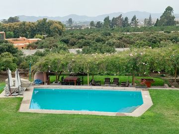 VENDO CASA DE CAMPO CON PLANTAS FRUTALES 5.5 HAS.