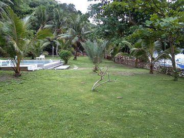 Beach & Dive Resort located on a beautiful white sand beach on Alad Island in the province of Romblon, Philippines.