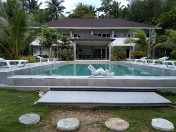 Beach & Dive Resort located on a beautiful white sand beach on Alad Island in the province of Romblon, Philippines.