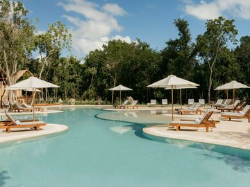 Departamentos en venta en playa del carmen con 2 habitaciones en una comunidad exclusiva