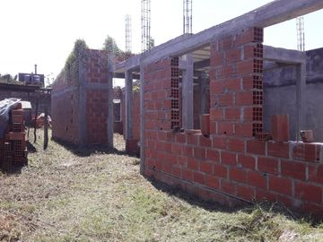 vendo terreno con construccion
