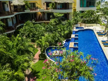 Condominio de lujo a 200 metros del mar, con club de playa, alberca, jacuzzi 100 metros de la Quinta Avenida, con servicios de hotel, concierge, amueb