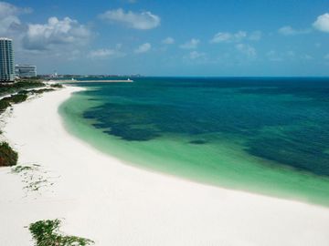Departamento de lujo, vista al mar, club de playa, campo de golf, Puerto Cancún