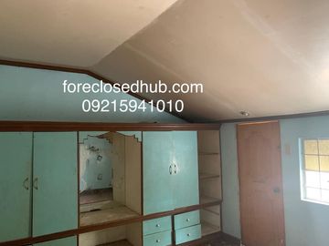 Laguna BelAir 1 dilapidated house near clubhouse