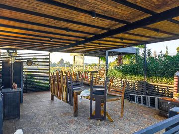 Se vende Gran casa en parcela, en prestigioso condominio, sector Los Naranjos, Curacaví.