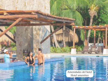 Condominio de dos pisos, frente a la alberca, comunidad con acceso al mar, venta, Sirenis, Tulum.