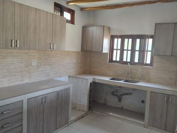 TERRENO EN VENTA INCLUYE CON CASA EN EL INTERIOR EN NUEVO CATACAOS
