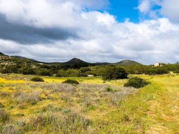 Terreno para construir tu casa de Descanso, en un ambiente con tranquilidad y seguridad en Rancho Banchetti