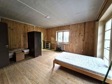 Casa Isla Teja vista hacia la costanera $ 1.500.000.000.-