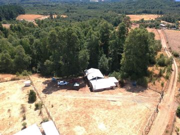 Parcela 5000 mt2 Chancoyan bajo, 2 casas $ 155.000.000.