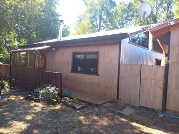Parcela 5000 mt2 Chancoyan bajo, 2 casas $ 155.000.000.