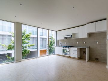 DEPARTAMENTO DE DOS RECAMARAS, DOS BAÑOS, DOS LUGARES DE ESTACIONAMIENTO Y JARDIN DE 80 M2, A UNOS MINUTOS DE SANTA FE