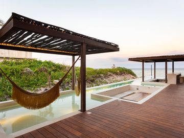 Condo  con alberca privada, acceso al mar, cub de playa, en venta, Tankah, Tulum.