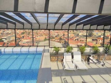 Departamento en venta por estrenar, con piscina sector Av. Don Bosco.