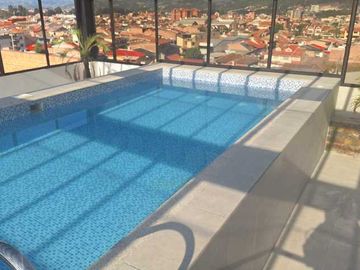 Departamento en venta por estrenar, con piscina sector Av. Don Bosco.