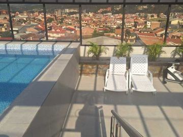 Departamento en venta por estrenar, con piscina sector Av. Don Bosco.
