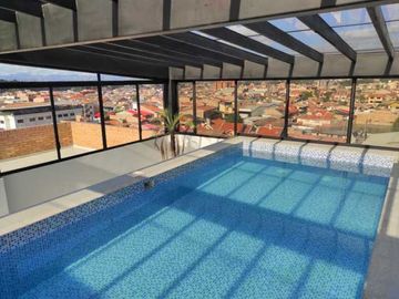 Departamento en venta por estrenar, con piscina sector Av. Don Bosco.