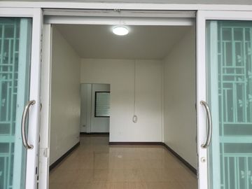 For Sale - One-Story Twin House in Sukhawadi Soi, Sung Noen, Nakhon Ratchasima. The house is situated on a 37 square wah plot and features 2 bedrooms