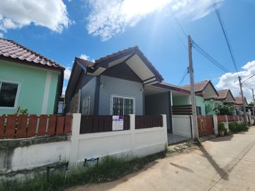 For Sale - One-Story Twin House in Sukhawadi Soi, Sung Noen, Nakhon Ratchasima. The house is situated on a 37 square wah plot and features 2 bedrooms