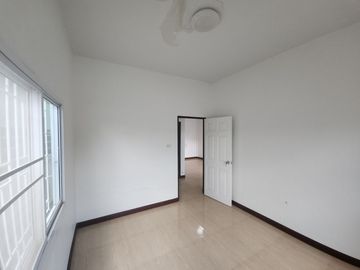 For Sale - One-Story Twin House in Sukhawadi Soi, Sung Noen, Nakhon Ratchasima. The house is situated on a 37 square wah plot and features 2 bedrooms