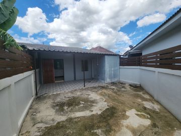 For Sale - One-Story Twin House in Sukhawadi Soi, Sung Noen, Nakhon Ratchasima. The house is situated on a 37 square wah plot and features 2 bedrooms