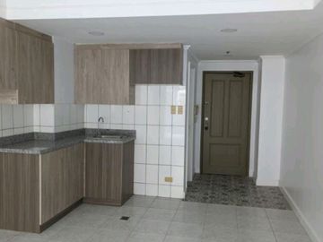 FOR SALE -Bare Studio Unit in Rosemont Tower, Quezon City