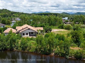A large house with 3 rai of land