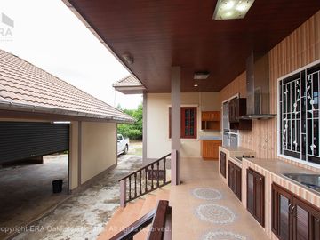 A large house with 3 rai of land