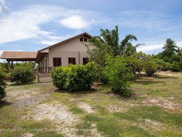 A large house with 3 rai of land