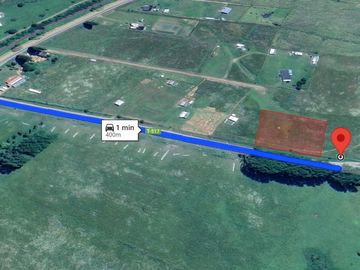 Parcela 10.000 m2 a orilla de camino