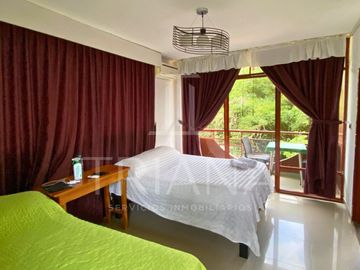 VENTA HOSTERIA FUNCIONAL EQUIPADA INVERSIÓN SANTO DOMINGO ECUADOR