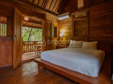 Bali Bliss Awaits: Own This Stunning Wooden Lodge Freehold 3-Bed Villa Near Soka Beach