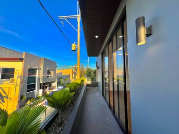 Experience luxury living in this brand new, three-story house and lot nestled within the prestigious Greenwoods Executive Village