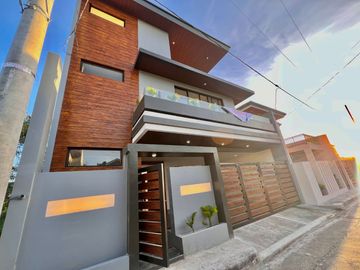 Experience luxury living in this brand new, three-story house and lot nestled within the prestigious Greenwoods Executive Village