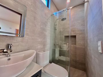Experience luxury living in this brand new, three-story house and lot nestled within the prestigious Greenwoods Executive Village