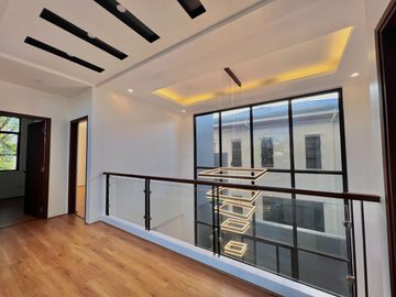 Experience luxury living in this brand new, three-story house and lot nestled within the prestigious Greenwoods Executive Village
