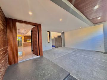 Experience luxury living in this brand new, three-story house and lot nestled within the prestigious Greenwoods Executive Village