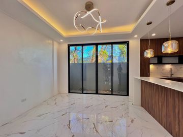 Experience luxury living in this brand new, three-story house and lot nestled within the prestigious Greenwoods Executive Village