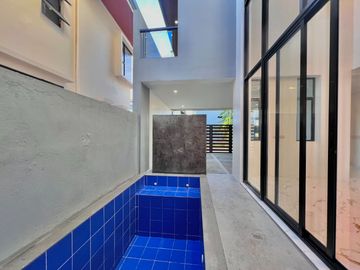 Experience luxury living in this brand new, three-story house and lot nestled within the prestigious Greenwoods Executive Village