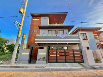Experience luxury living in this brand new, three-story house and lot nestled within the prestigious Greenwoods Executive Village