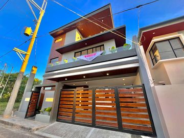 Experience luxury living in this brand new, three-story house and lot nestled within the prestigious Greenwoods Executive Village