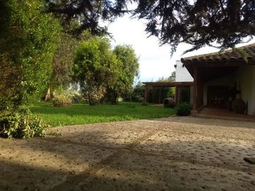 CAMPO CON CASA PATRONAL TERRENO-PARCELA, QUINCHO, GALPONES, CASA CUIDADOR Y 19,33 HECTAREAS