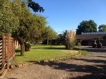 CAMPO CON CASA PATRONAL TERRENO-PARCELA, QUINCHO, GALPONES, CASA CUIDADOR Y 19,33 HECTAREAS