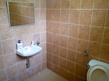 Beautiful Spanish Style 4 BR/4Bath home in a fully enclosed gated property