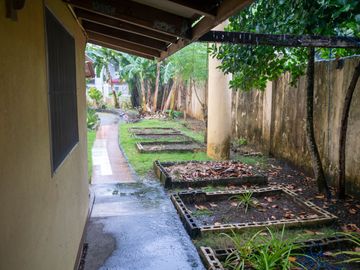 Beautiful Spanish Style 4 BR/4Bath home in a fully enclosed gated property