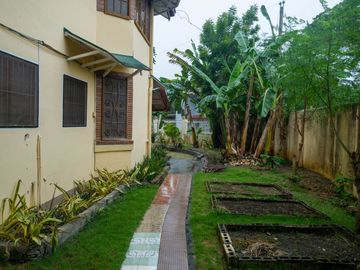 Beautiful Spanish Style 4 BR/4Bath home in a fully enclosed gated property