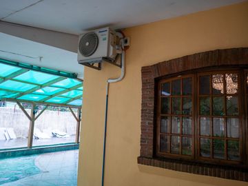 Beautiful Spanish Style 4 BR/4Bath home in a fully enclosed gated property
