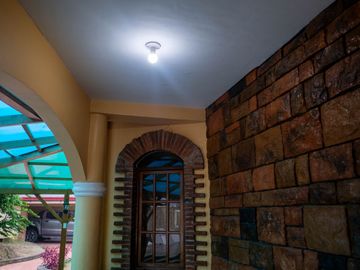 Beautiful Spanish Style 4 BR/4Bath home in a fully enclosed gated property
