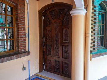 Beautiful Spanish Style 4 BR/4Bath home in a fully enclosed gated property