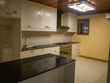 Beautiful Spanish Style 4 BR/4Bath home in a fully enclosed gated property